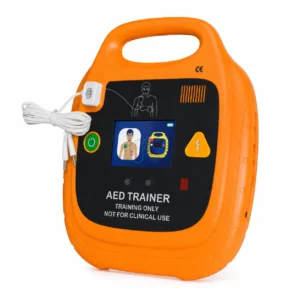 Orangenes AED-Trainingsgerät mit integriertem Bildschirm und Kabeln, gekennzeichnet für Trainingszwecke, nicht für den klinischen Einsatz.