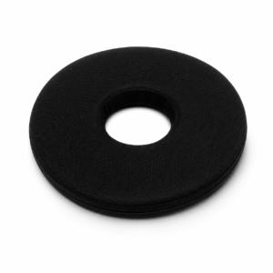 Black fabric donut-shaped cushion with a central hole (a ring-style cushion).
