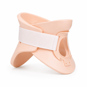 Peach-colored medical walking boot with a wide white Velcro strap for ankle stabilization and immobilization after injury