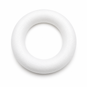 Weißer Schaumstoffring in Donut-Form mit hohler Mitte und strukturierter Oberfläche, von oben betrachtet.